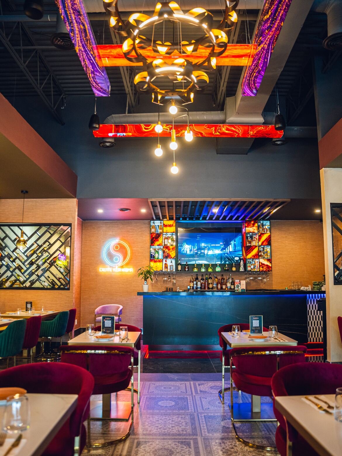The Karma bar lit in blue and red neon